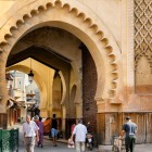 The entrance arch of the Mellah district in Fès welcomes visitors into a labyrinth of Moroccan Jewish history and culture.