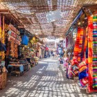 Marrakech market: handmade rugs, painted ceramics, and local crafts, perfect for taking home a piece of Morocco.
