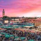 Aerial view of Jamaa el-Fna, a lively square with markets, street performers, and unique atmospheres in the beating heart of Marrakech.