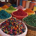 Fresh spices and aromatic herbs fill Moroccan markets with intense scents, forming the foundation of authentic local cuisine flavors.