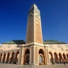 The Hassan II Mosque in Casablanca, with its imposing minaret, is a historical and architectural masterpiece, a symbol of faith and modernity overlooking the Atlantic.