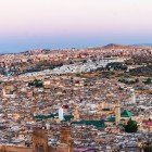 Aerial view of Fès: the ancient medina winds through alleys and minarets, offering unique glimpses of Moroccan history, culture, and architecture.