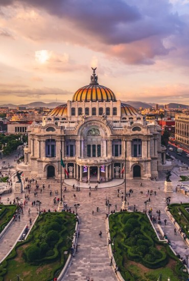 The Palace of Fine Arts in Mexico City, with its white marble façade and Art Deco interiors, hosts murals, concerts, and exhibitions, a true cultural symbol of the country.