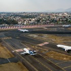 At Benito Juárez International Airport in Mexico City, planes taking off, landing, and taxiing reflect the dynamic pace of one of the main hubs in the Americas.