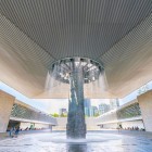 The entrance of the National Museum of Anthropology in Mexico City amazes with the iconic Umbrella Fountain, welcoming visitors into millennia of history and culture.