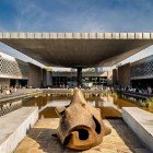 Marking the museum’s entrance, a Teotihuacan monolithic statue introduces the treasures inside, symbolizing the harmony between ancestry and modernity in Mexico City.