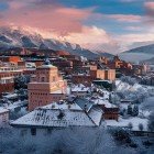 Ifrane under the snow enchants with European architecture, pristine nature, and fairytale atmospheres among mountains and tree-lined avenues.