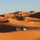 A 4x4 journey in Merzouga unveils the towering Sahara dunes, hidden oases, and Berber villages, amidst breathtaking desert landscapes and pristine nature.