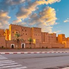 Taourirt is a historic kasbah in Ouarzazate, with rammed-earth structures, inner courtyards, and traditional decorations that tell the story of Berber life.