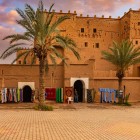 Taourirt Kasbah in Ouarzazate, built in the 17th century and expanded in the 19th century by the Glaoui, is an impressive fortress with courtyards, towers, and traditional rooms.