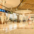 Bright interiors of Marrakech Menara Airport with efficient access to gates, relaxation areas, duty-free shops, and modern services for travelers.