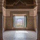 The Telouet Kasbah, the former residence of the Glaoui, preserves rooms decorated with stuccoes, mosaics, and carved wood, nestled among the mountains of the High Atlas.