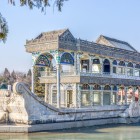 The Marble Boat in the Summer Palace, built for the empress, is an impressive symbolic stone vessel decorated with sculptures and imperial motifs on Kunming Lake.