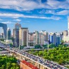 Panorama of Beijing between ancient temples and modern skyscrapers - an intertwining of millennia-old tradition and contemporary design in the heart of the Chinese capital.