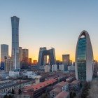 From sunset, Beijing’s skyscrapers light up, creating a spectacular panoramic view with warm lights and modern architecture.
