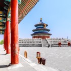 View of the Hall of Prayer in the Temple of Heaven: blue roofs and Ming decorations reflecting the harmony between heaven, earth, and imperial power.