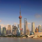Panoramic view of Shanghai, where modern skyscrapers meet historic architecture and green spaces in the heart of the city.