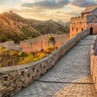 The Great Wall of China stretches over 21,000 km across mountains and plains, linking towers and fortifications in a masterpiece of history and engineering.