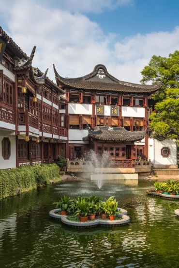 The Yu Garden in Shanghai is a classic Chinese masterpiece featuring ponds, rocks, bridges, and plants that reflect the art of traditional landscaping.