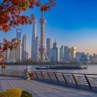 Breathtaking panoramic view of Shanghai with its iconic TV tower dominating the skyline, a symbol of the city's modernity and dynamism.