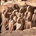 The Terracotta Army, discovered in 1974, guarded the tomb of the first Qin emperor, a symbol of power and millennial Chinese funerary art.