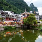 The town of Yangshuo, nestled among karst mountains and rivers, preserves lively markets, traditional architecture, and the historic atmosphere of southern China.