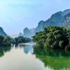 The karst mountains of Guilin are reflected in the waters of the Li River, creating one of the most iconic and photographed landscapes in China.