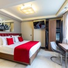 The double room at Ramada Pera Istanbul offers a double bed, Wi‑Fi, private bathroom, air conditioning, and city views in the heart of the Beyoğlu district.