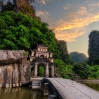 Bích Động Pagoda, built in 1428 during the Lê dynasty, stands among karst mountains and represents an important spiritual and cultural center of Vietnam.