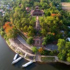 From above, Thien Mu Pagoda in Hué showcases its imperial architecture and the surrounding river panorama, blending history and spirituality.