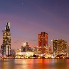 Panoramic view of Ho Chi Minh, with modern skyscrapers, bustling traffic, and rivers, reflecting the energy and urban life of Vietnam.