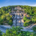 Panoramic view of King Khai Dinh’s Tomb in Hué: lavish architecture, intricate decorations, and spectacular views of the surrounding hills of the imperial city.