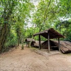 Cu Chi, a Viet Cong base, preserves tunnels and historical traps, showcasing defensive tactics and the intense history of the Vietnamese conflict.