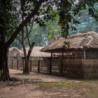 In the Hanoi Ethnology Park, stilt houses and huts of various ethnic minorities stand as living testimonies of Vietnam’s rural architecture.