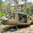 At the Cu Chi site in Ho Chi Minh, a helicopter on display illustrates war strategies and the intense history of Vietnamese resistance.