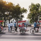 A cyclo ride around Hoan Kiem Lake offers charming views of Hanoi’s Old Quarter among temples, centuries-old trees, and lively daily life.
