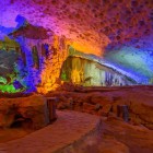 Thien Cung Cave in Halong Bay, famous for its spectacular stalactites and stalagmites, offers a unique and evocative underground landscape.