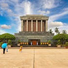 The Ho Chi Minh Mausoleum in Hanoi houses the remains of the Vietnamese leader and stands as a monumental symbol of the nation’s history and patriotism.