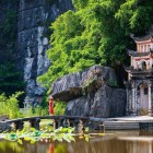 Bích Động Pagoda in Ninh Bình, nestled among karst mountains, is a historic complex that combines spirituality, traditional architecture, and natural landscapes.