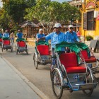 The cyclo, a traditional rickshaw of Hanoi, is a city icon that allows visitors to slowly discover its historic streets and authentic Vietnamese atmosphere.