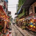 The train tracks in Hanoi run between narrow houses and local cafés, forming a unique and fascinating urban passage in the heart of the city.