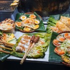 Vietnamese street food among alleys and stalls: soups, noodles, and traditional snacks that tell the story of Vietnam’s culinary culture.