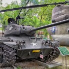 Exhibits of tanks, planes, and photographs at the War Museum reveal the history of the war and its impact on Ho Chi Minh.