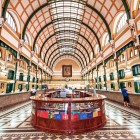 The interiors of Saigon’s Central Post Office feature high ceilings, elegant arches, and historic counters, reflecting the charm of French colonial architecture.