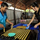 Artisans of the Mekong Delta make handmade coconut candies, blending tradition with the authentic flavors of rural Vietnam.