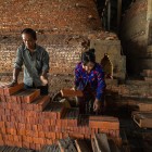 In the Mekong Delta, Vietnamese artisans make bricks by hand, combining manual skills, clay, and techniques passed down through generations.