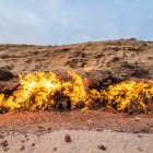 The Yanardag hill in Azerbaijan is crossed by natural flames burning along the slope, fueled by continuous underground gas seepages.