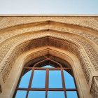 The entrance portal of the Bibi Heybat Mosque in Baku features elegant carved decorations and refined arches, a striking example of Azerbaijani Islamic architecture.