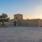 The Fire Temple on the Absheron Peninsula in Azerbaijan is an ancient stone complex symbolizing fire worship, set in a historic and evocative atmosphere