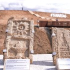 The plaques displayed on Yanardag hill illustrate historical artifacts and symbols related to fire worship, with inscriptions and carvings reflecting Azerbaijan’s religious and cultural traditions.